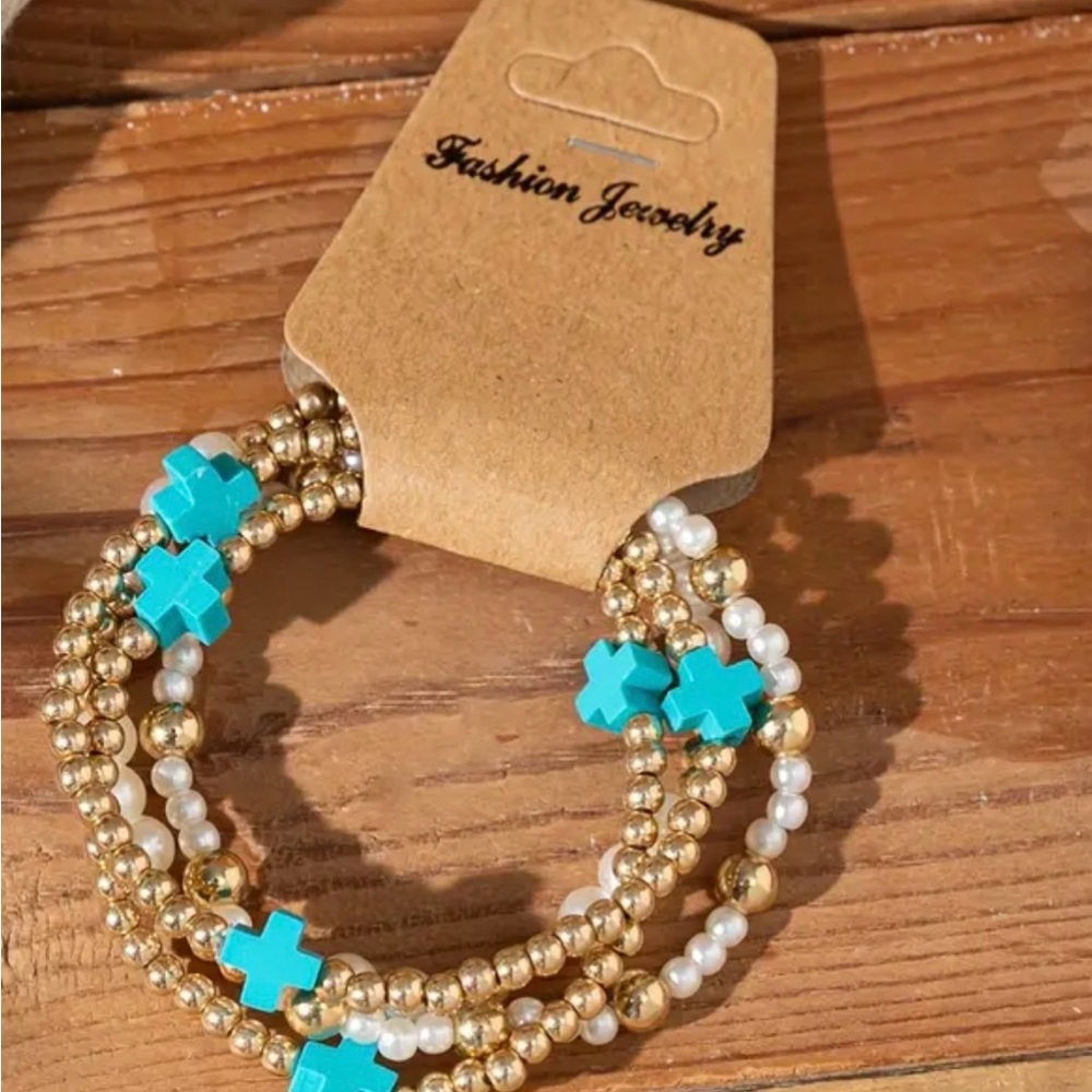 Set of 4 stretch bracelets.